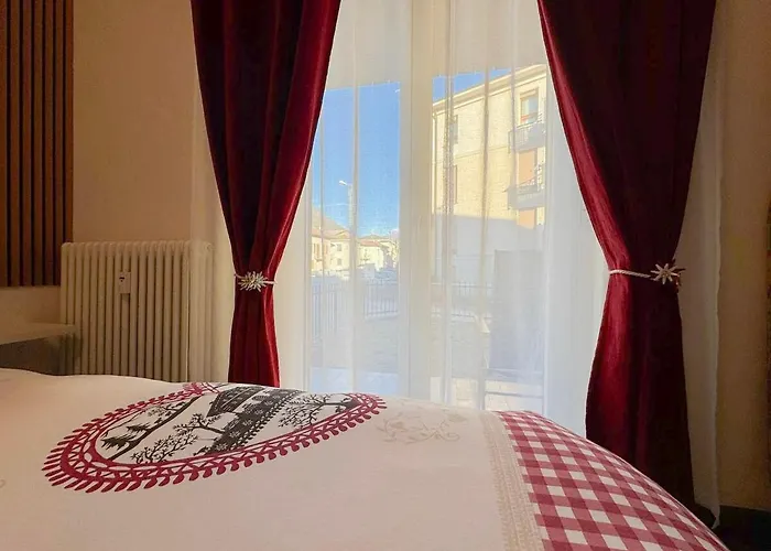 Апартаменты Nido Alpino - Casetta Con Giardino, Vista Montagne *